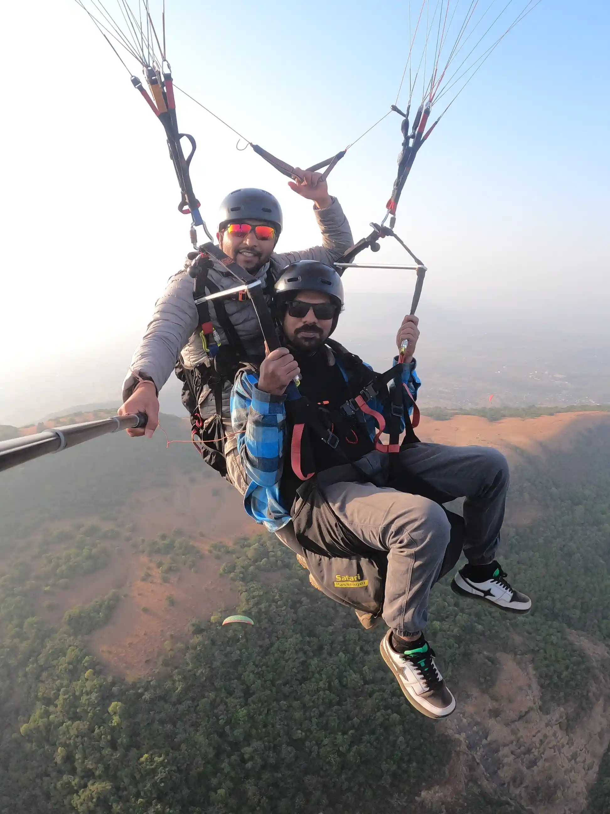 Group paragliding near Lonavala for corporate events